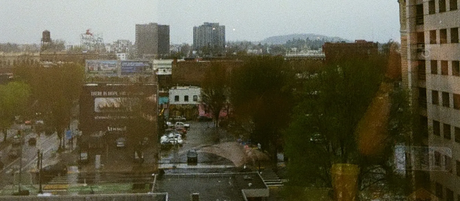 The Portland skyline and the West Hills seen from the Thread office window on an overcast afternoon.